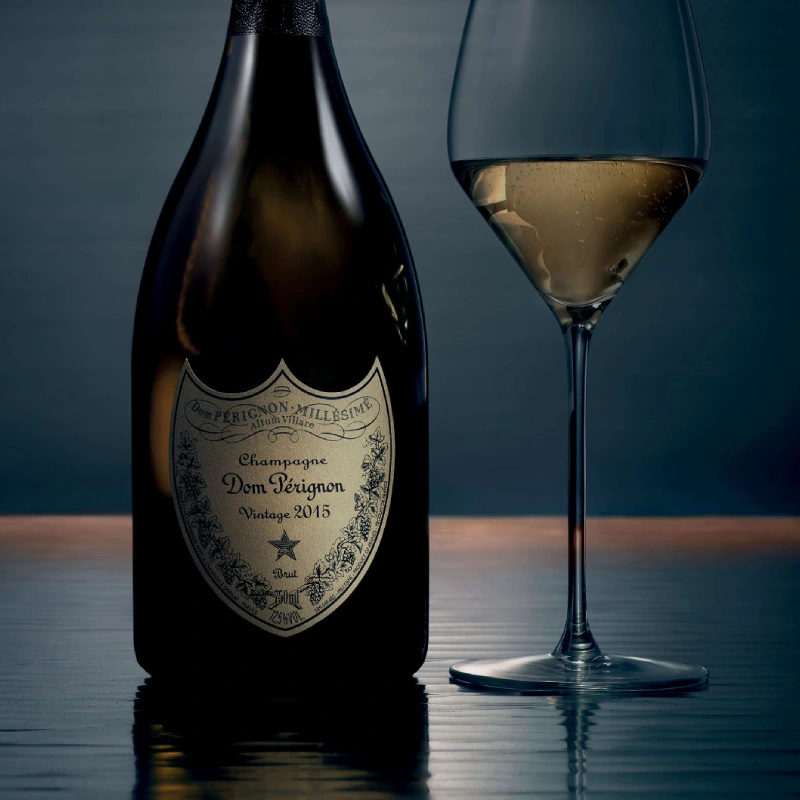 Dom Pérignon Vintage 2015 with champagne glass