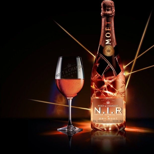 Moët & Chandon N.I.R. Nectar Impérial Rosé Dry 75CL with a filled Moët & Chandon champagne glass against a dark background