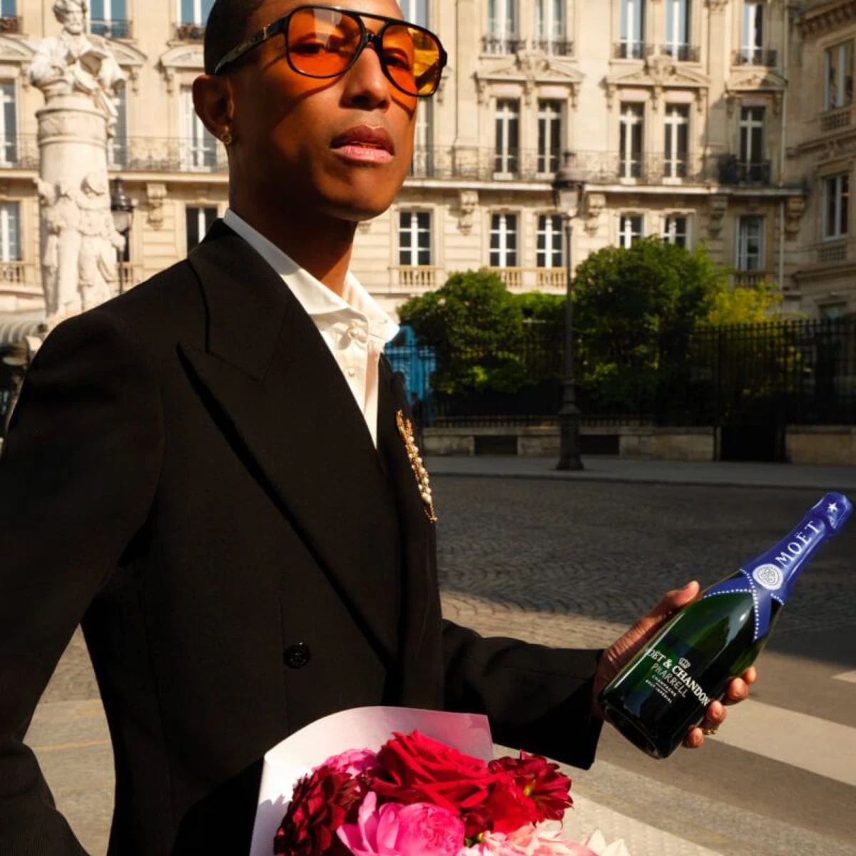 Pharrell Williams with Moët & Chandon Midnight Blue bottle 